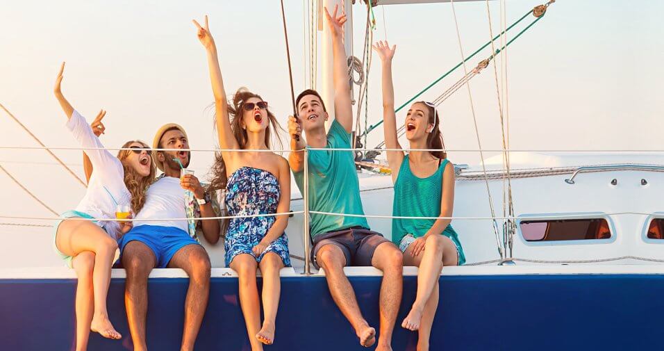 people taking selfie on a boat