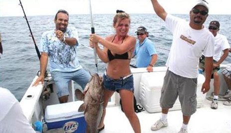 people on boat fishing