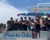 people taking a picture in yatch